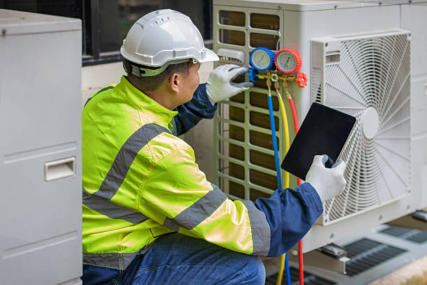 Professional Heat Pump Repair technician working in Marilla, NY